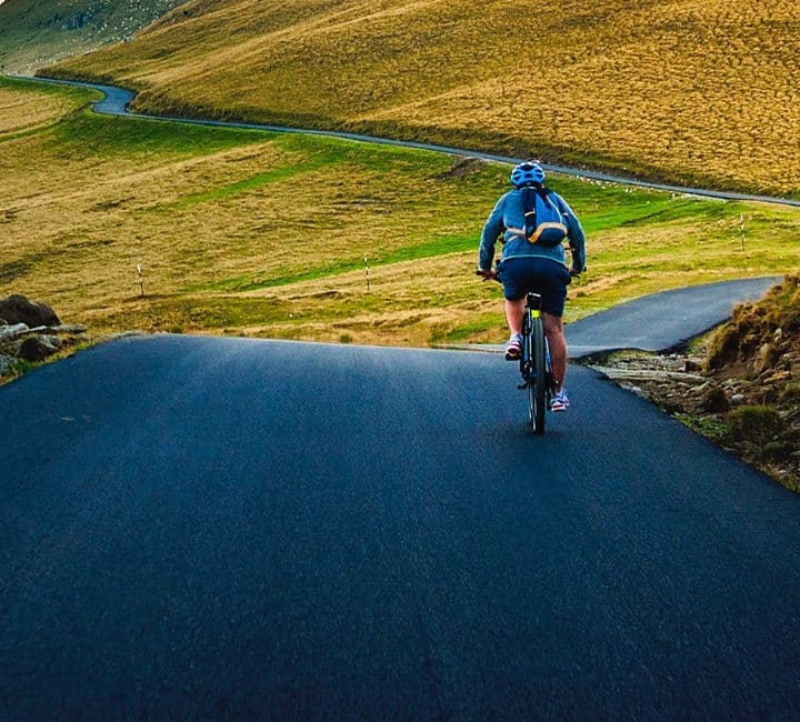 Riding Mountain Bike on the open Road